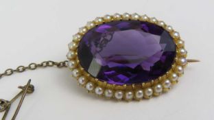 A 19th or early 20th century amethyst and split pearl brooch