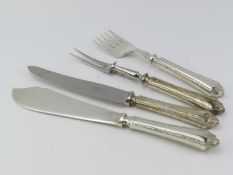 A Mappin and Webb carving knife and fork