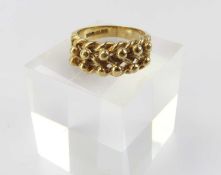 A 9ct gold ball and shot ring,