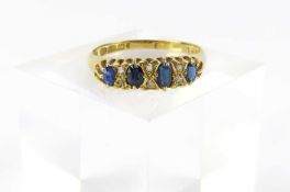 An 18ct gold sapphire and diamond dress ring