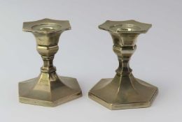 A pair of Mappin and Webb dwarf candlestick holders