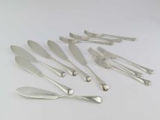 A set of six silver fish knives and forks