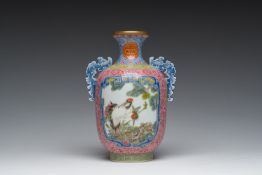 A Chinese falangcai vase with birds among blossoming branches, Qianlong mark, 20th C.