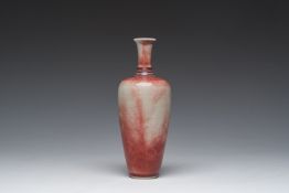 A Chinese monochrome peachbloom-glazed vase, Kangxi mark, 19th/20th C.
