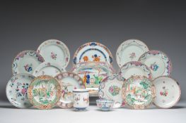 A varied collection of Chinese famille rose and Imari style porcelain with floral and Mandarin desig