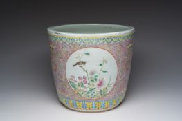 A Chinese famille rose jardinière with birds among blossoming branches and floral design, 19th C.