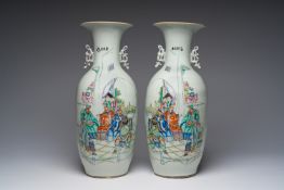 A pair of Chinese famille rose 'animated palace scene' vases, 19th/20th C.