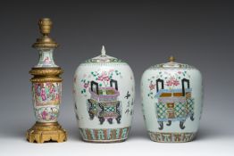 Two Chinese famille rose 'flower baskets' jars and covers and a Canton vase mounted into a lamp, 19t