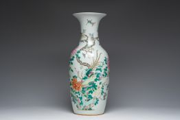 A Chinese famille rose vase with a pheasant and butterflies among blossoming branches, 19th C.