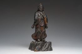 A Japanese carved and patinated wooden 'Idaten' (Skanda) figure, 19th C.