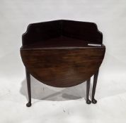 George III mahogany corner table with high galleried rail to the two corner sides, the oval drop-