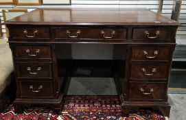 Brights of Nettlebed twin-pedestal desk in the George III manner, the rectangular top with brown