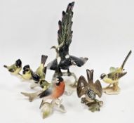 Group of German porcelain models of birds, early 20th century, various printed factory marks,