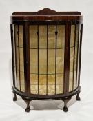 1920's/30's mahogany bowfronted display cabinet, the single door with key opening to a gold-coloured