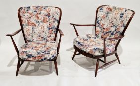Pair of mid-century Ercol Windsor armchairs having winged and spindle backs, model no. 477, 83cm