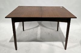 Mid-century teak extending dining room table of rectangular form on square tapering legs, 74cm