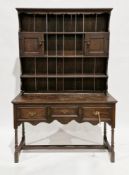 Oak Welsh dresser in the George III style, the upper section with three shelves and two small