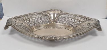 German 800 grade silver bowl, of oval form with pierced sides, embossed bow and ribbon and foliate
