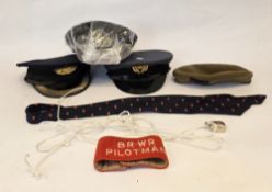 Early 20th century tramways uniform cap with metal badge no.3809, size 7 1/4, a railways station