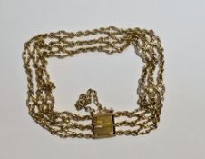 9ct yellow gold three-strand chain link bracelet, the square clasp marked with a registration number