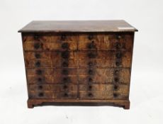 Walnut chest in the George III manner, the rectangular top with thumbmoulded edge, over two banks of
