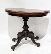 19th century walnut fold-over card table, the demi-lune top folding over to form a circle, with