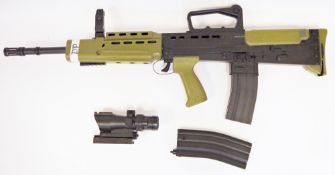 L85 / SA80 style airsoft rifle, black plastic body and green plastic furniture, with 2 BB magazines,
