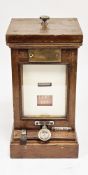 Early 20th century railways mahogany lamp in/lamp out indicator with brass plaque, 26cm high (please