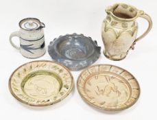 Howard Charles studio pottery bowl, with fluted rim, in mottled blue glaze, impressed H and leaf