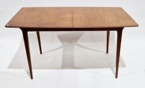 Mid-century McIntosh Afrormosia teak extending dining table with single fold-out leaf, on tapering