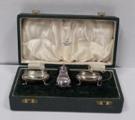 Cased silver three-piece cruet set, Birmingham 1962, Walker & Hall, comprising salt, mustard and