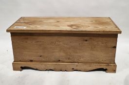 Pine coffer in the 18th century style, the rectangular hinged lid opening to an empty space, on