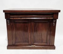 Victorian mahogany side cabinet, the rectangular top over a long frieze cushion drawer and two panel