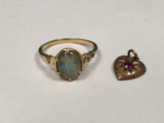 9ct yellow gold ring set with a claw-set Triplex oval opal, opal approx 1cm long, ring size N½ and a