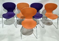 Five stackable cafe bistro chairs with polypropylene shell seats with ribbed backs, on tubular