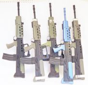 Five L85 / SA80 style airsoft rifles, four in black and green, a further in black and blue, with