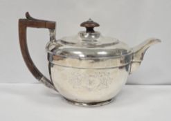 George III silver teapot with wooden handle and knob to lid, London 1778, maker’s mark rubbed,