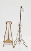 Late 19th/early 20th century Arts & Crafts brass standard lamp on three scrolling splayed legs