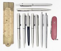 Collection of nine pens including a Parker fountain pen, a Parker 45 ballpoint pen, four further