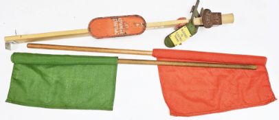 Railways fabric green flag and fabric red flag on wooden flagpoles, red flag 59cm wide, a railways