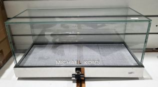 Contemporary Michael Kors counter top shop display cabinet of rectangular form, comprising five