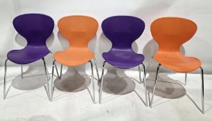 Eight stackable cafe bistro chairs with polypropylene shell seats with ribbed backs, on tubular