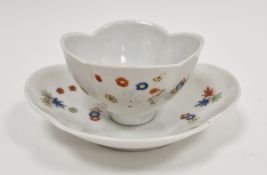 Meissen porcelain kakiemon quatrefoil teabowl and saucer, circa 1729, overglaze blue crossed