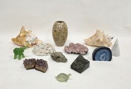 Fossilised limestone vase, 18cm high together with two Queen conch shells and another shell, two