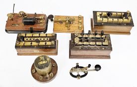 Three early 20th century electrical testing resistance boxes including WG Pye & Co ER83, Marconi and
