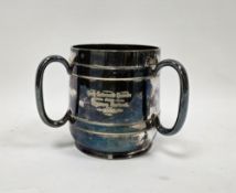 Victorian silver-plated presentation tyg of barrel form, with raised girdles and three loop handles,