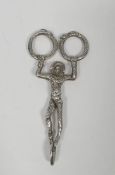 Set of silver sugar tongs in the form of a harlequin/court jester, London import marks for 1900,