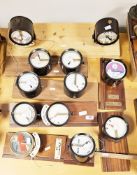12 early 20th century railway signal indicators/repeaters, 11 in circular bakelite cases and one