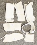 Army brown canvas kit bag containing a large quantity of canvas leggings and anklets