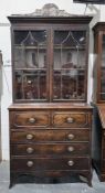 Early 19th century mahogany secretaire bookcase, the upper section with moulded cornice over two